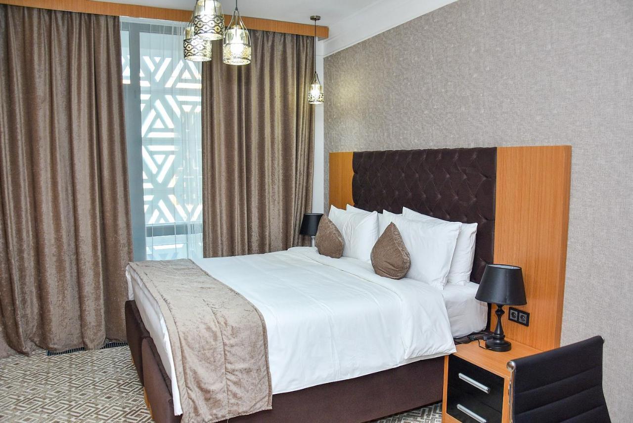 Hotel Ramada By Wyndham Turkistan Extérieur photo