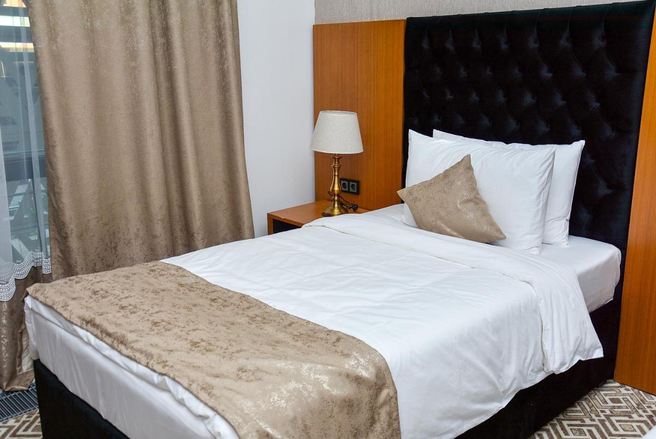 Hotel Ramada By Wyndham Turkistan Extérieur photo