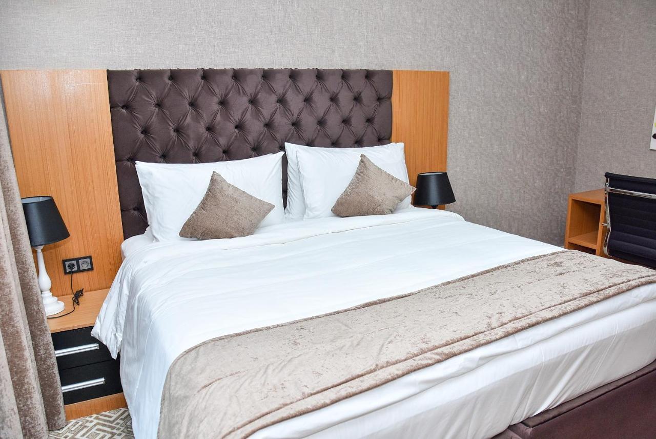 Hotel Ramada By Wyndham Turkistan Extérieur photo